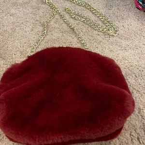 Cute red fluffy clutch with gold